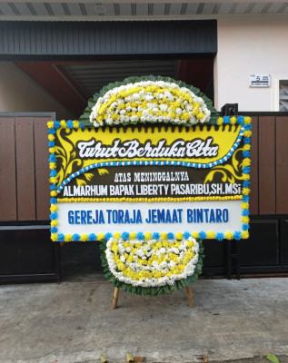 Papan Bunga Duka di Bakunase Dua
